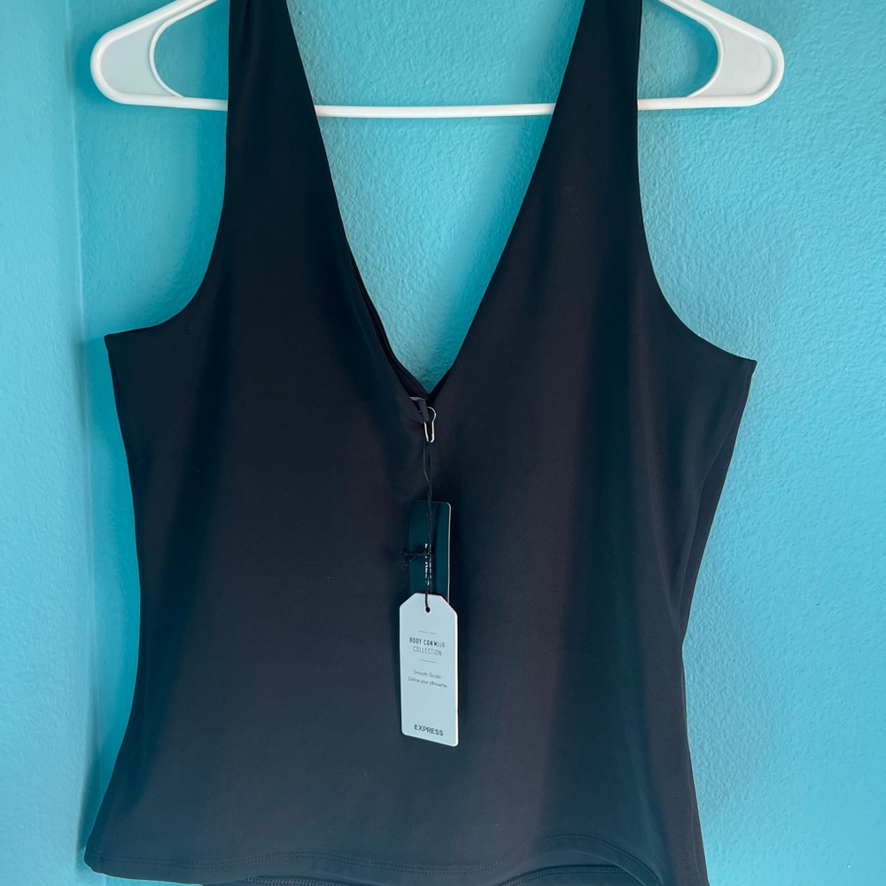NEW BODY CONTOUR TOPS
ALL LARGE BUT NOT THE PINK ONE MEDIUM